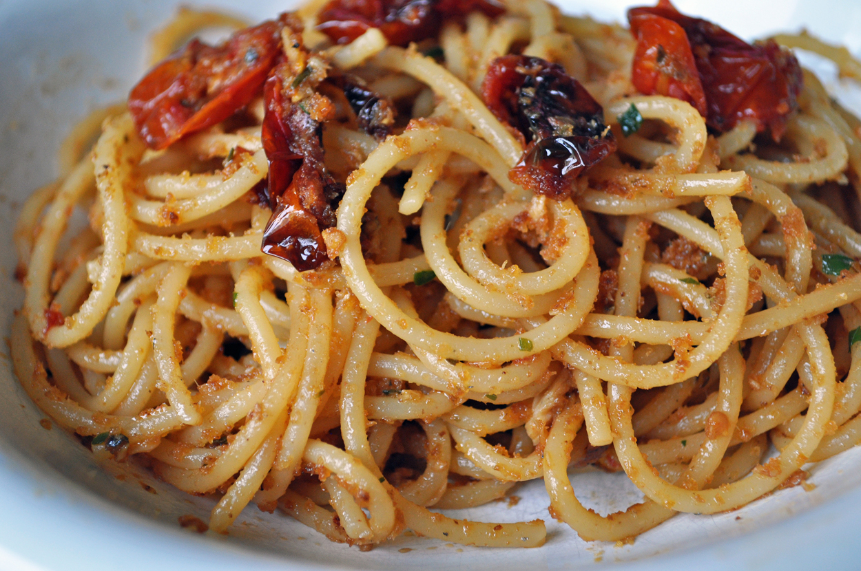 Spaghetti with marinated anchovies and confit cherry tomatoes