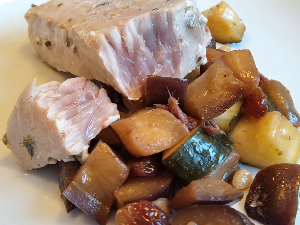Tuna fillets in a pan with sweet and sour vegetables